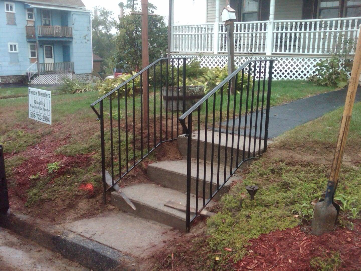 Outdoor scene featuring a metal staircase