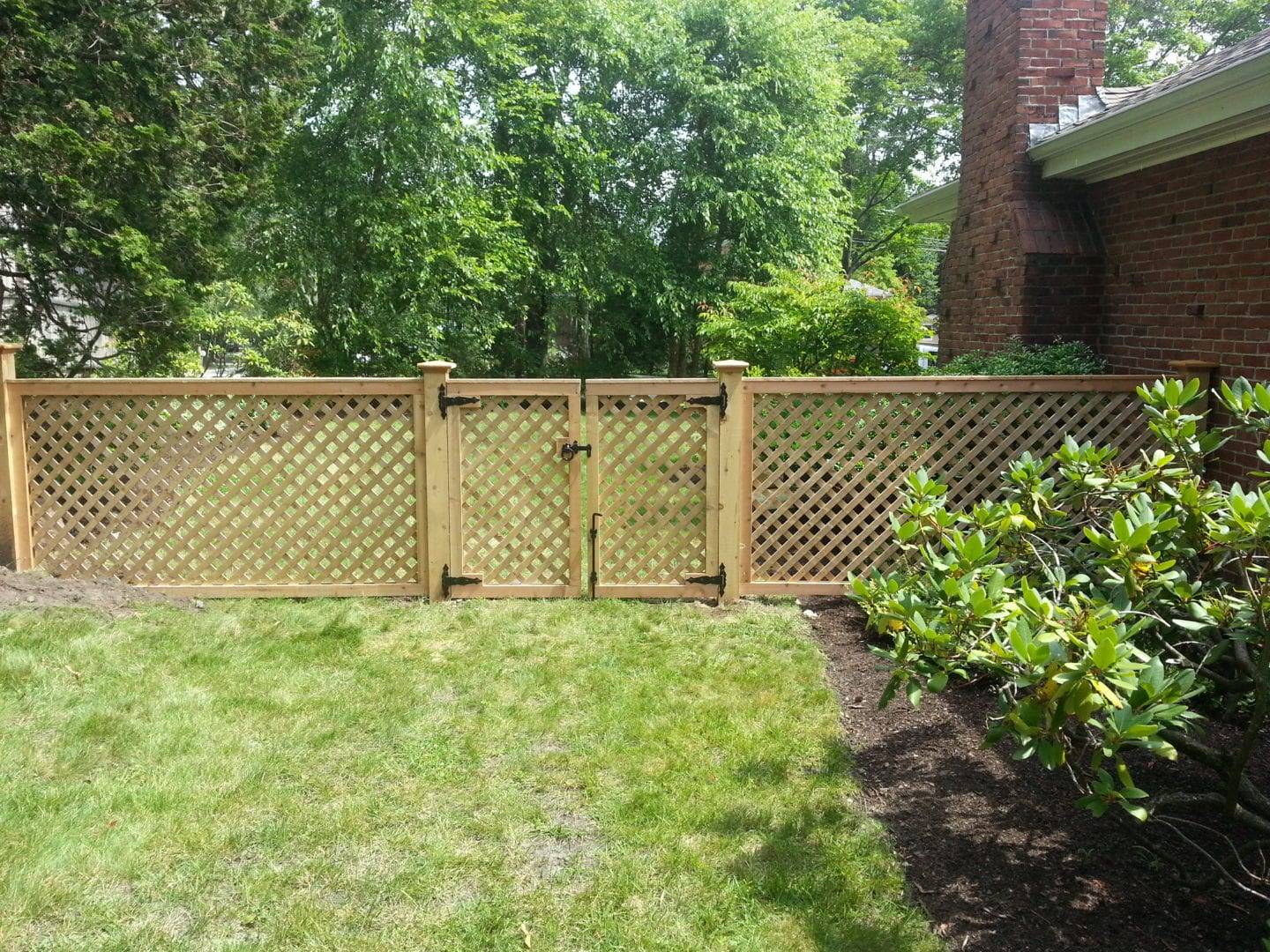 Chain link style fence with the use of wood